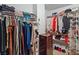 Spacious walk-in closet with ample storage, featuring shelving, hanging rods, and a chest of drawers at 8432 Squaw Valley Ave, Las Vegas, NV 89128