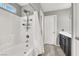 Bright bathroom featuring a shower-tub combo at 8639 Tortoise Canyon Ct, Las Vegas, NV 89148