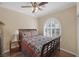 Comfortable bedroom featuring hardwood floors, and plantation shutters at 8645 Deering Bay Dr, Las Vegas, NV 89131