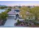 Home with well-maintained landscaping, solar panels, and a private driveway, enhancing its curb appeal at 10534 Mandarino Ave, Las Vegas, NV 89135