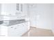 Bright kitchen featuring white cabinets, granite countertops, and modern fixtures at 10534 Mandarino Ave, Las Vegas, NV 89135