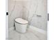 A contemporary toilet with modern tiling at 10534 Mandarino Ave, Las Vegas, NV 89135