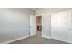 Simple bedroom with carpet flooring, closet and neutral wall color at 1056 Via Panfilo Ave, Henderson, NV 89011