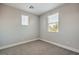 Small bedroom with neutral walls, carpet and natural light from the window at 1056 Via Panfilo Ave, Henderson, NV 89011