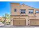 Inviting two-story home with a two-car garage and a well-maintained exterior in a desirable community at 1056 Via Panfilo Ave, Henderson, NV 89011