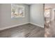 Bright room with large window and modern flooring at 1056 Via Panfilo Ave, Henderson, NV 89011