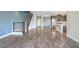 Modern living area with sleek staircase and open access to the kitchen, great for entertaining and everyday living at 1056 Via Panfilo Ave, Henderson, NV 89011