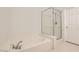 Relaxing bathroom with large tub and glass-enclosed shower at 10800 Amber Ridge Dr # 103, Las Vegas, NV 89144