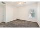 Carpeted bedroom features a window for natural light at 10800 Amber Ridge Dr # 103, Las Vegas, NV 89144
