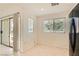 Cozy dining area with sliding glass door to the patio at 10800 Amber Ridge Dr # 103, Las Vegas, NV 89144