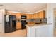 Charming kitchen featuring granite counters and stainless appliances at 10800 Amber Ridge Dr # 103, Las Vegas, NV 89144