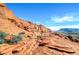 Panoramic view of rugged red rock formations against a clear blue sky at 10800 Amber Ridge Dr # 103, Las Vegas, NV 89144