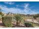 Scenic view of the community showing lush landscaping and the mountains in the distance at 10800 Amber Ridge Dr # 103, Las Vegas, NV 89144