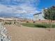 Well-maintained community park with lush landscaping and seating areas at 10819 Far Country Ave, Las Vegas, NV 89129