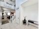 Inviting foyer with tiled floors, high ceilings, and an open staircase leading to the upper level at 10819 Far Country Ave, Las Vegas, NV 89129