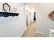 Upstairs hallway featuring neutral colored walls and carpet with decor at 10819 Far Country Ave, Las Vegas, NV 89129