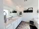 Spacious main bathroom with double sinks, soaking tub, and modern vanity lighting at 10819 Far Country Ave, Las Vegas, NV 89129