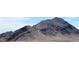 Panoramic mountain view, offering a breathtaking vista of rugged terrain and natural beauty from a distance at 10819 Far Country Ave, Las Vegas, NV 89129