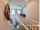 View of the staircase leading to a carpeted upper level with living room at 10819 Far Country Ave, Las Vegas, NV 89129