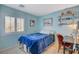 Bright bedroom with a window and shelving offers a cozy retreat at 112 Austin Rose Ave, Henderson, NV 89002