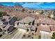 Charming two-story home showcases desert landscaping, mountain views and attached two car garage at 112 Austin Rose Ave, Henderson, NV 89002