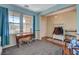 Inviting living area with large windows and unique decor that provide lots of natural light at 112 Austin Rose Ave, Henderson, NV 89002
