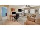 Spacious living room with a ceiling fan, and lots of space for home office and relaxation at 112 Austin Rose Ave, Henderson, NV 89002