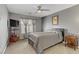 Spacious bedroom features neutral paint, carpet, and a ceiling fan at 1150 Red Margin Ct # 101, Las Vegas, NV 89183