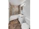 Bathroom with white vanity, tiled shower and modern fixtures at 1200 Cunningham Dr, Las Vegas, NV 89106