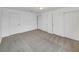 Large bedroom with neutral carpet flooring and white doors and trim throughout at 1200 Cunningham Dr, Las Vegas, NV 89106