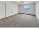 Bedroom offers neutral carpet flooring, three closets and plenty of natural light at 1200 Cunningham Dr, Las Vegas, NV 89106