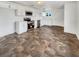 Modern kitchen featuring stainless steel appliances, white cabinetry, and durable tile flooring at 1200 Cunningham Dr, Las Vegas, NV 89106