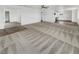 Expansive living room showcases carpet and tile flooring, neutral paint, and an open layout at 1200 Cunningham Dr, Las Vegas, NV 89106