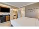 Bedroom with kitchenette, closet, and interesting Vegas-themed wall art at 125 E Harmon Ave # 2205, Las Vegas, NV 89109