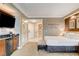Bedroom with kitchenette and access to spa-like bathroom and shower at 125 E Harmon Ave # 2205, Las Vegas, NV 89109