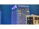 Striking nighttime view of the Cosmopolitan Hotel and the dazzling city skyline at 125 E Harmon Ave # 2205, Las Vegas, NV 89109