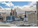 Expansive city view showcasing iconic landmarks and a vibrant skyline under a bright, cloudy sky at 125 E Harmon Ave # 2205, Las Vegas, NV 89109