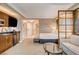 This stylish condo offers open living spaces, a kitchen area, and a bed at 125 E Harmon Ave # 2205, Las Vegas, NV 89109