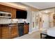 This kitchenette includes modern appliances, sleek countertops, and a great view at 125 E Harmon Ave # 2205, Las Vegas, NV 89109