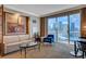 Relax in this well-lit living room with city views from floor-to-ceiling windows at 125 E Harmon Ave # 2205, Las Vegas, NV 89109