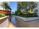 Beautiful walkway with lush landscaping and a Starbucks Coffee shop at 125 E Harmon Ave # 2205, Las Vegas, NV 89109