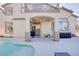 Spacious backyard with a patio and a glimpse of the pool at 1252 Autumn Wind Way, Henderson, NV 89052