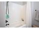 Bright bathroom featuring a clean white tiled shower with a curtain at 1252 Autumn Wind Way, Henderson, NV 89052