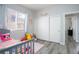 bedroom with a twin bed, a sliding door closet, and a window at 1252 Autumn Wind Way, Henderson, NV 89052