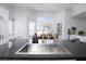 Elegant kitchen with granite countertops, stainless steel sink, and view to the dining area at 1252 Autumn Wind Way, Henderson, NV 89052