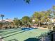 Basketball court in a grassy neighborhood park at 2020 Rainbow View St, Henderson, NV 89012