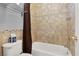 Bathroom featuring tiled shower/tub, adding functionality and style to the space at 2020 Rainbow View St, Henderson, NV 89012