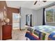Bedroom with carpet and an adjoining bathroom, providing a convenient layout for relaxation at 2020 Rainbow View St, Henderson, NV 89012