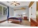 Bedroom with window and ceiling fan, offering a comfortable and relaxing space to unwind at 2020 Rainbow View St, Henderson, NV 89012
