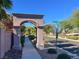 Community entrance with street signs to Desert Shadow Trail at 2020 Rainbow View St, Henderson, NV 89012
